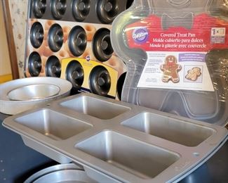 Client was professional baker! 1000's of molded bakeware tins, vintage cake decor, wedding cake towers, silicone pans, cookie cutters, candy molds, other baking items +++