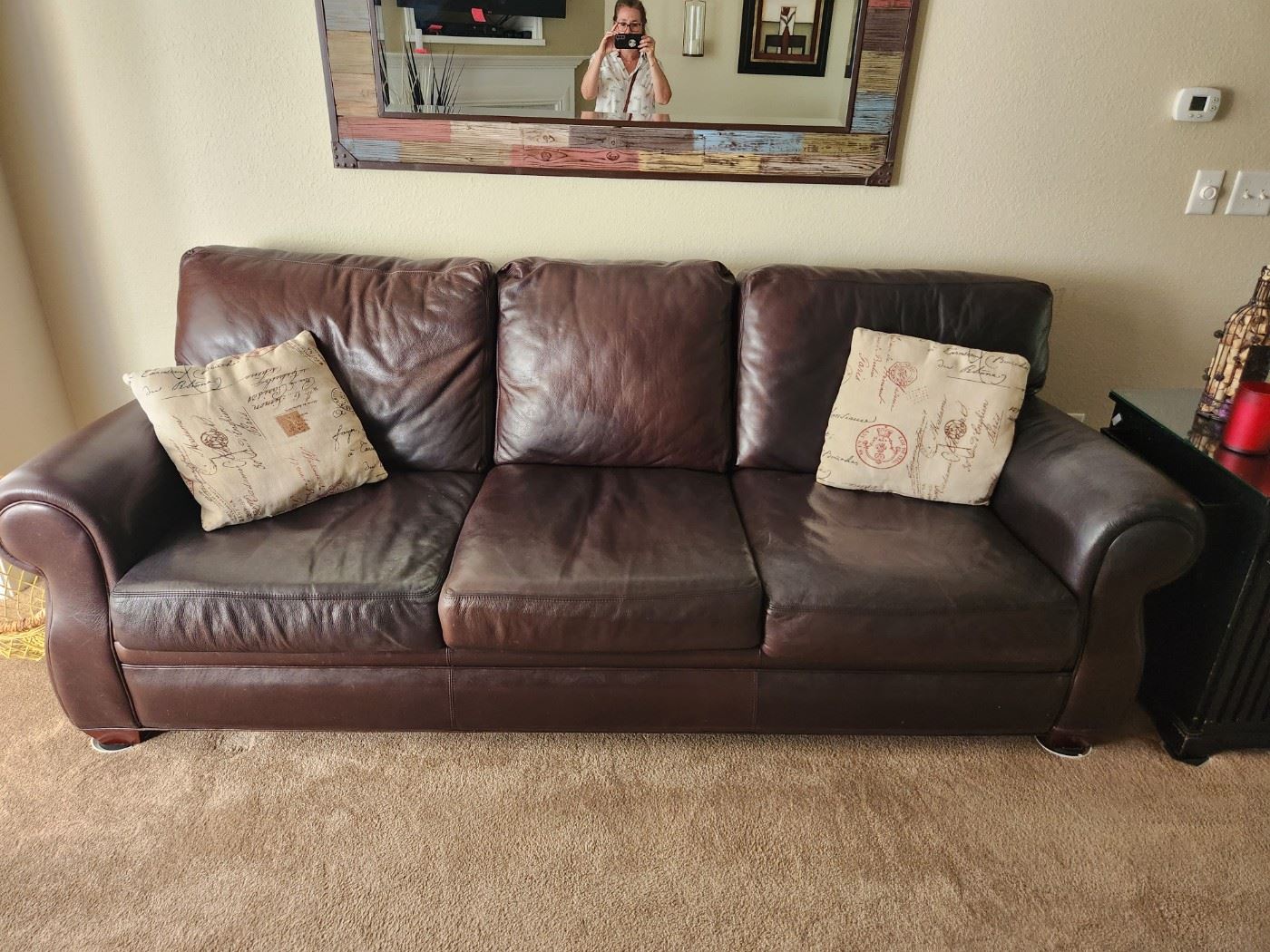 Fine Designs leather sofa