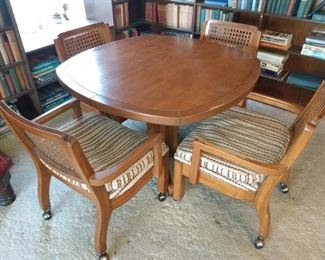 Mid-century oak table with 4 rattan chairs