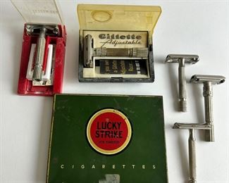 Lucky Strike cigarette tin and vintage razors