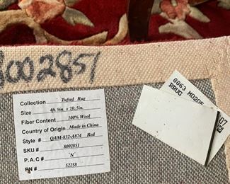 #23	rug	burgundy tuffed 100 wool rug 4.9x7.5 inches 	 $100.00 			
