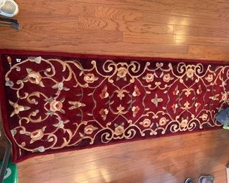 #24	rug	burgundy tuffed 100% wool rug runner 28x90	 $75.00 			
