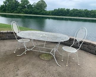 #40	patio	oval whited painted metal table with 2 chairs 60x36x26	 $100.00 			
