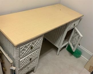 #75	wicker desk with 4 drawers and 1 door laminate top 45x18x28	 $65.00 			
