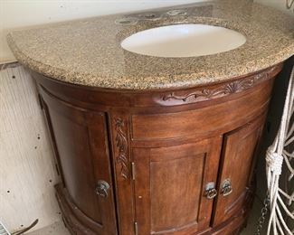 #82	vanity sink with 4 doors half moon cabinet 36x21x35	 $120.00 			
