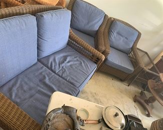 #102	Hampton Bay sofa 2 swivel chairs and coffee table plastic wicker with cushions 	 $200.00 			
