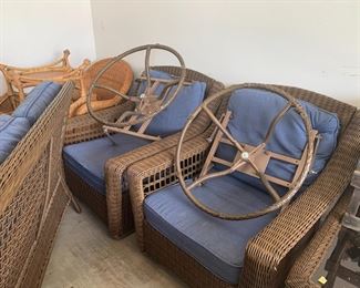 the swivels for the chairs are detached and sitting on the chair.                                                                                                       #102	Hampton Bay sofa 2 swivel chairs and coffee table plastic wicker with cushions 	 $200.00 			

