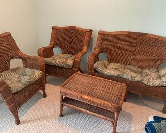 #126	4 piece brown wicker set with sofa, 2 chairs, table 	 $100.00 			

