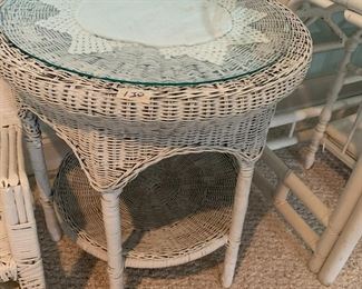#130	wicker round table with glass on top 22x23	 $25.00 			
