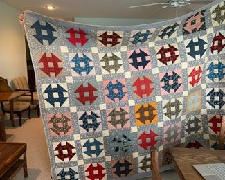 #142	machine pieced hand quilted  monkey ranch pattern  86x74 as is back stain 	 $30.00 			
