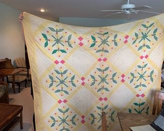 #143	hand quilted yellow flower design as is dirty  80x66	 $40.00 			
