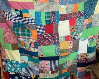#146	hand knotted quilt with 70;s fabric  70x64 	 $25.00 			
