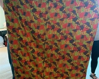 #146	hand knotted quilt with 70;s fabric  70x64 	 $25.00 			
back fabric