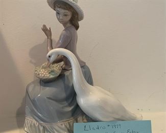 #164	Llodra 1979 Girl with goose eating statue 	 $65.00 			
