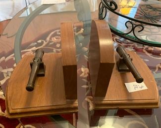 #187 brass canon book ends $20.00