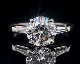 Iconic Harry Winston Style Solitaire 2.35 Carat Diamond Three-Stone Baguette Ring in 14k White Gold, VS Clarity - Triple X; $15,850 Retail