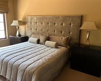 King size bed, linens, two fabulous night stands and lamps.