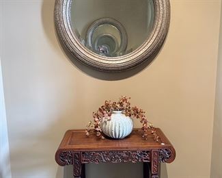 Chinese Elm Alter/accent table with beautiful carvings.  One of two round beveled glass mirrors.