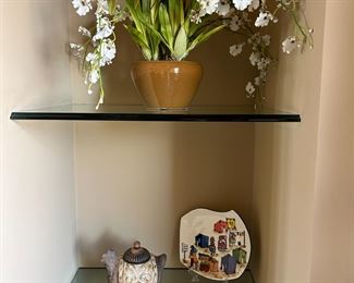 There are several nice silk flower arrangements at the sale.