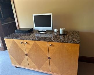 Designer dresser with marble top.  Has two matching nightstands.