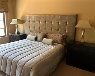 Yet another king size bed and handsome nightstands and lamps.