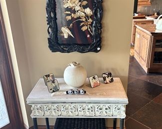 Chinese sculptural wall piece, metal console table and a splash of Asian decorations for your home.