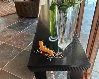 Fabulous and massive console table and fun vases and a lizard.