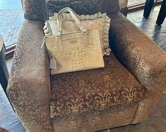 Armchair with Brahmin bag.