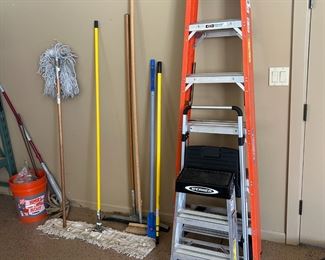 Ladders and brooms and mops.