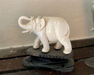 Bone elephant on base