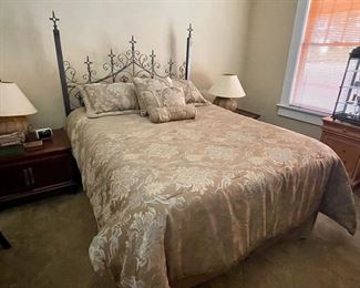 Beautiful unique bed with gothic iron headboard
