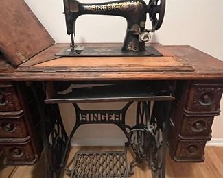 Antique sewing machine by singer