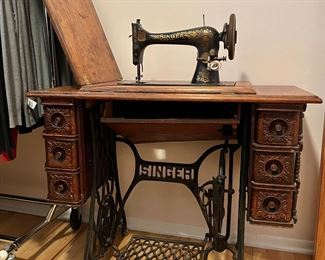 1902 Antique sewing machine by singer