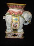 A CHINESE POLYCHROME GARDEN SEAT IN THE SHAPE OF AN ELEPHANT.