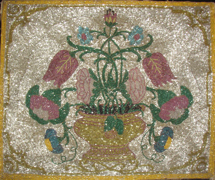 EARLY 19TH CENTURY BEADED PICTURE OF A BOUQUET OF FLOWERS, NICE
CONDITION WITH NO BEADS MISSING.