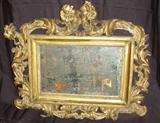 EARLY 19TH CENTURY ITALIAN AND GILT WITH GESSO WALL MIRROR.