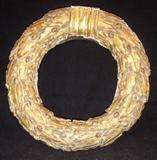 CARVED WOOD WREATH WITH GILDING.