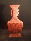 CHINESE CINNABAR VASE WITH STYLIZED DRAGON LUGS, LATE 19TH CENTURY.