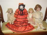 A LARGE COLLECTION OF ANTIQUE FRENCH AND GERMAN BISQUE HEAD DOLLS.