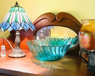 True vintage stained glass miniature lamp featuring blue flowers, turquoise depression glass bowl, amber carnival glass vase, antique engraved silver-plate child's cup, vintage salt and pepper shakers