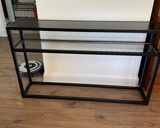 Two matching sofa tables. Black metal and glass