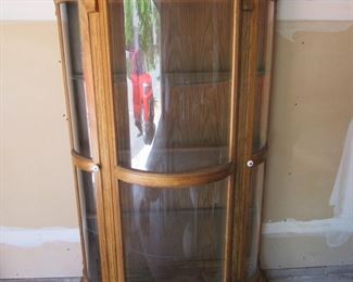 Large antique curved glass cabinet