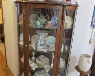 Curved glass cabinet, Lenox gold rimmed Colonnade china set, Fenton, Figgjo Flint Norway tea set and other pieces