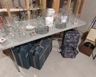 Glass vases and luggage