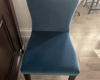 "Oka" brand, six chairs, two blue, two gray, two saffron yellow