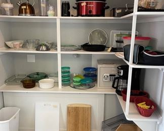 pantry stocked with small appliances, storage items and more
