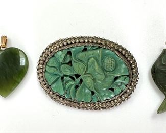 #140 • Two Carved Stone Pendants and One Asian Brooch
