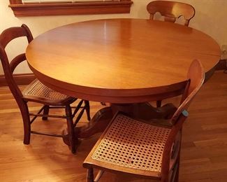 Vintage Spencer Table Company Oak Pedestal Table and Cane Chairs