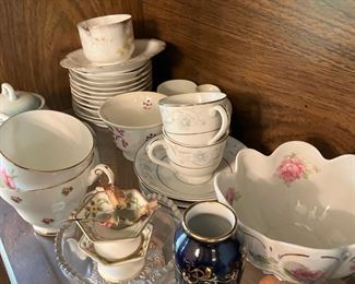 China Coffee Cups and Bowls in Cabinet