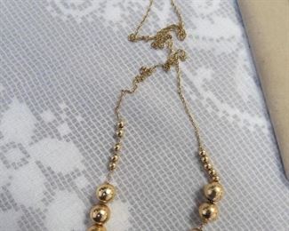14k gold bead necklace.
